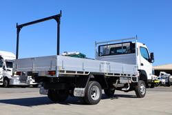 2025 Fuso Canter 4x4 Single Cab with Alloy Tray with Ladder Racks White