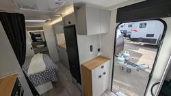 2025 New Age Caravans 19' Big Red Slide Out Save $11,099 Was $110,990