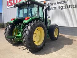  John Deere
                6090Mc 