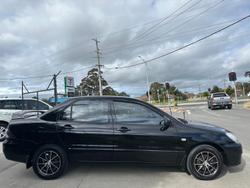 2004 Mitsubishi Lancer ES CH MY05 Black Mica