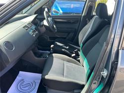 2010 SUZUKI
                SWIFT 