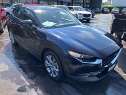 2024 Mazda
                CX-30 G20 Evolve
