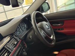 2014 BMW
                3 Series 320i Sport Line