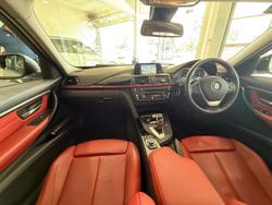 2014 BMW
                3 Series 320i Sport Line