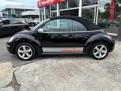 2010 Volkswagen Beetle BlackOrange 1Y MY10 Black