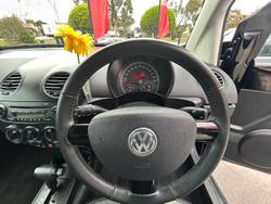 2010 Volkswagen Beetle BlackOrange 1Y MY10 Black