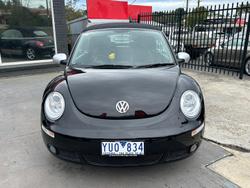 2010 Volkswagen Beetle BlackOrange 1Y MY10 Black