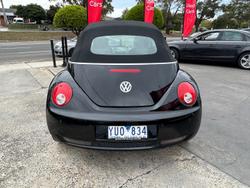 2010 Volkswagen Beetle BlackOrange 1Y MY10 Black