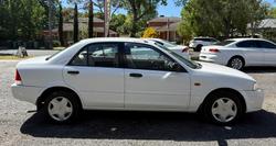 2002 Ford Laser LXi KQ Polar White