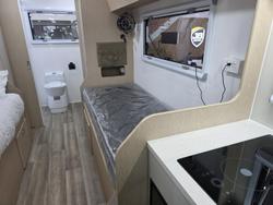 2024 New Age Caravans NAM8 (Single Bed Configuration)