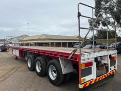 2012 CIMC Tri Axle Flat Top