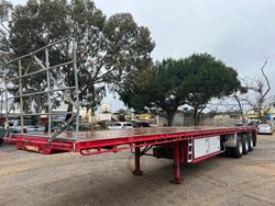 2012 CIMC Tri Axle Flat Top