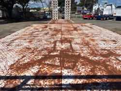 Howard Porter Tri Axle Drop Deck With Bi-Fold Ramps