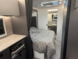 2025 New Age Caravans 20' Big Red Slide-Out Br20 Save $11,199 Was $111,990