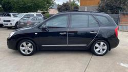 2008 Kia Rondo EX-L UN Black Cherry