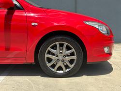 2010 Hyundai i30 Trophy FD MY11 Shine Red