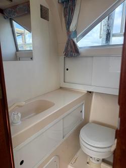 1996 Caribbean 28 FLYBRIDGE CRUISER