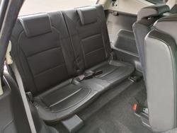 2011 Nissan Dualis +2 Ti J10 Series II MY10 Magnetic Red