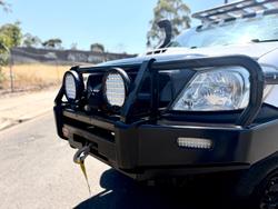 2010 Toyota Hilux SR KUN26R MY10 4X4 Glacier White