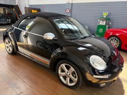 2010 Volkswagen Beetle BlackOrange 1Y MY10 Black