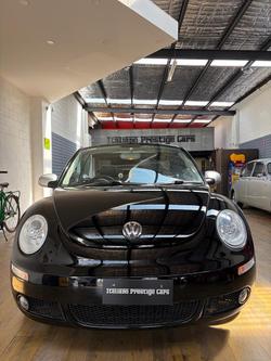 2010 Volkswagen Beetle BlackOrange 1Y MY10 Black
