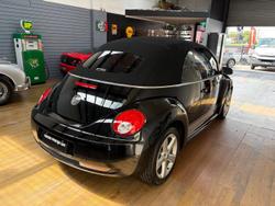 2010 Volkswagen Beetle BlackOrange 1Y MY10 Black