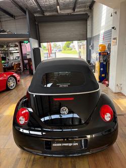 2010 Volkswagen Beetle BlackOrange 1Y MY10 Black