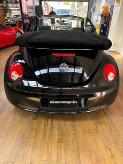 2010 Volkswagen Beetle BlackOrange 1Y MY10 Black