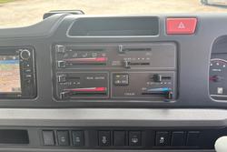 2023 Toyota Coaster GDB70R French Vanilla