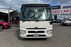 2023 Toyota Coaster GDB70R French Vanilla