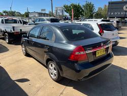 2011 HOLDEN BARINA 4D MY11