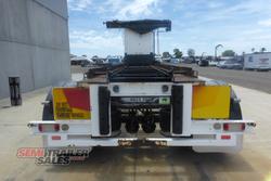 2006 HaulMaster Hook Lift Dog Trailer